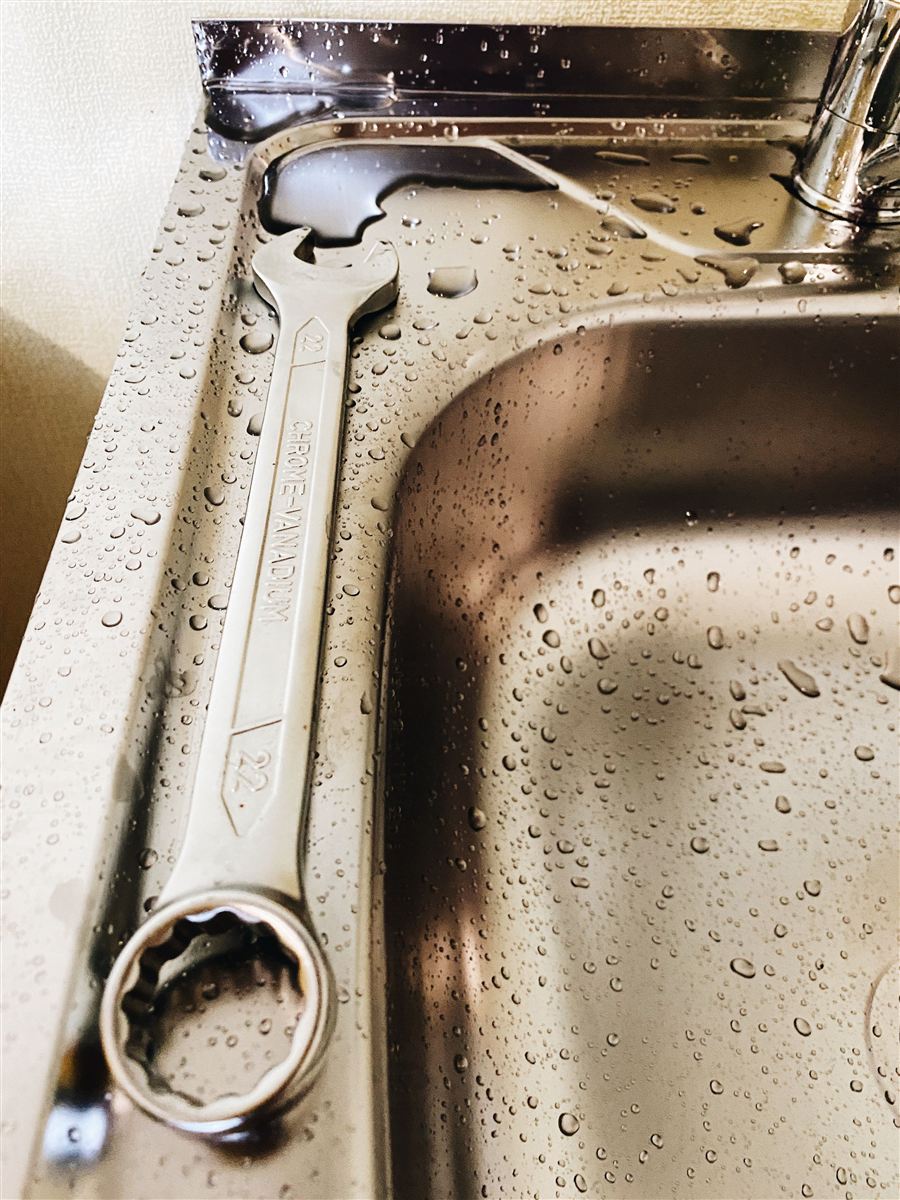 Kitchen sink and drain plumbing in a home